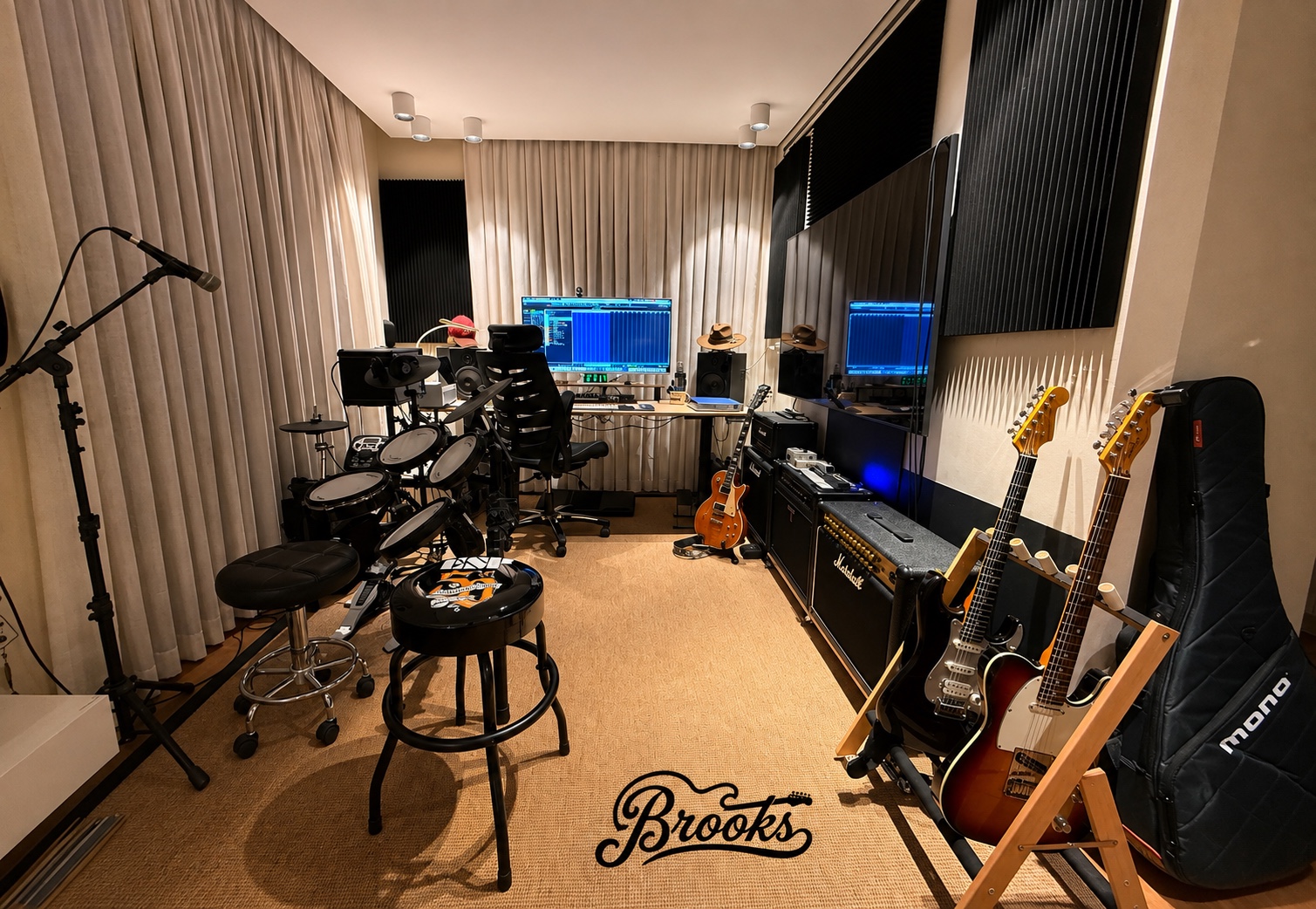 Moshe Brooks' home studio with guitars, drums, amplifiers and recording desk